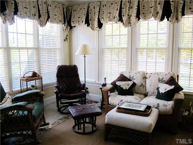 3401 Barron Berkeley Way Raleigh, NC 27612 - Photo 13 of 25 a living room with furniture and a window