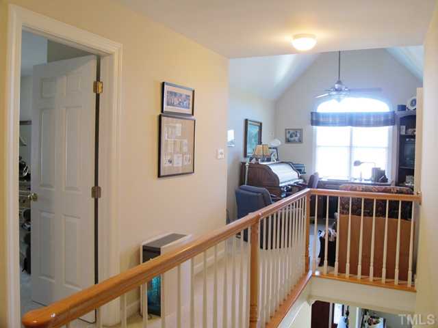 3401 Barron Berkeley Way Raleigh, NC 27612 - Photo 17 of 25 a view of an entryway wooden floor and windows