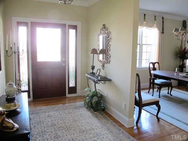 3401 Barron Berkeley Way Raleigh, NC 27612 - Photo 2 of 25 a view of a livingroom with furniture and a window
