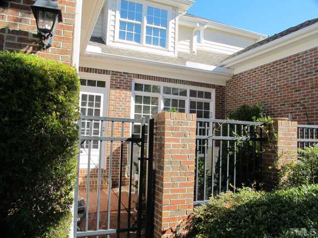 3401 Barron Berkeley Way Raleigh, NC 27612 - Photo 23 of 25 a view of a house with a window and balcony