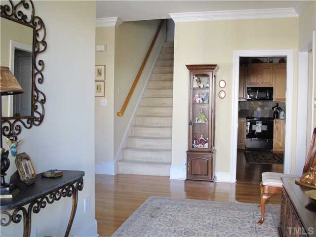 3401 Barron Berkeley Way Raleigh, NC 27612 - Photo 3 of 25 a view of an entryway with workspace and bedroom