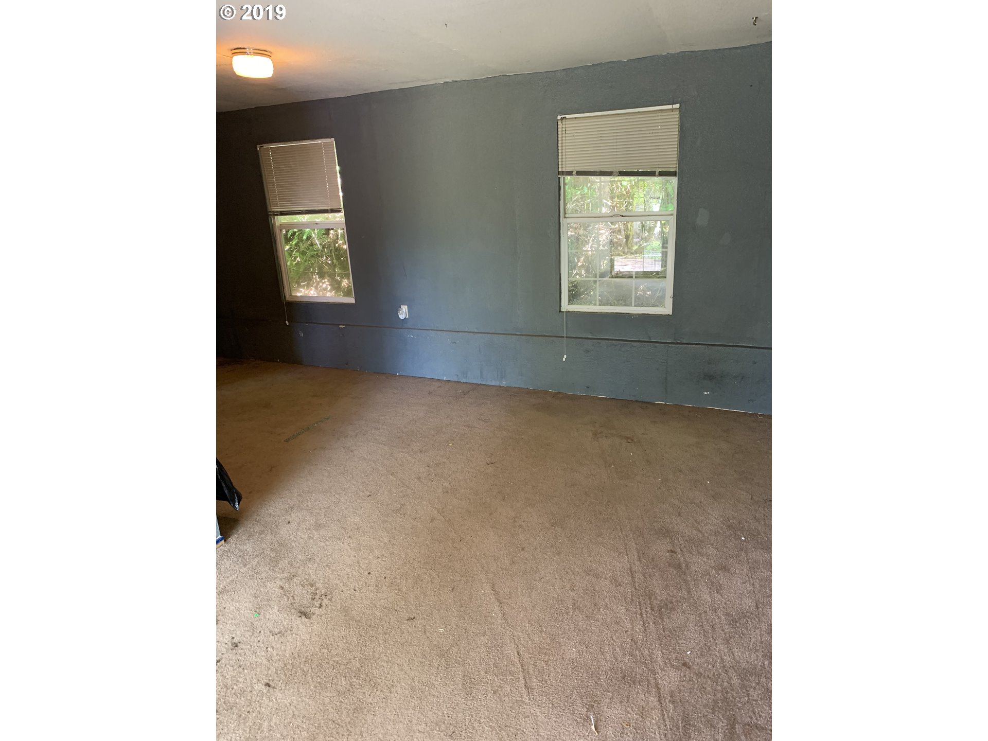 39969 Southwest Gibson Road Gaston, OR 97119 - Photo 6 of 11 a view of an empty room with a window