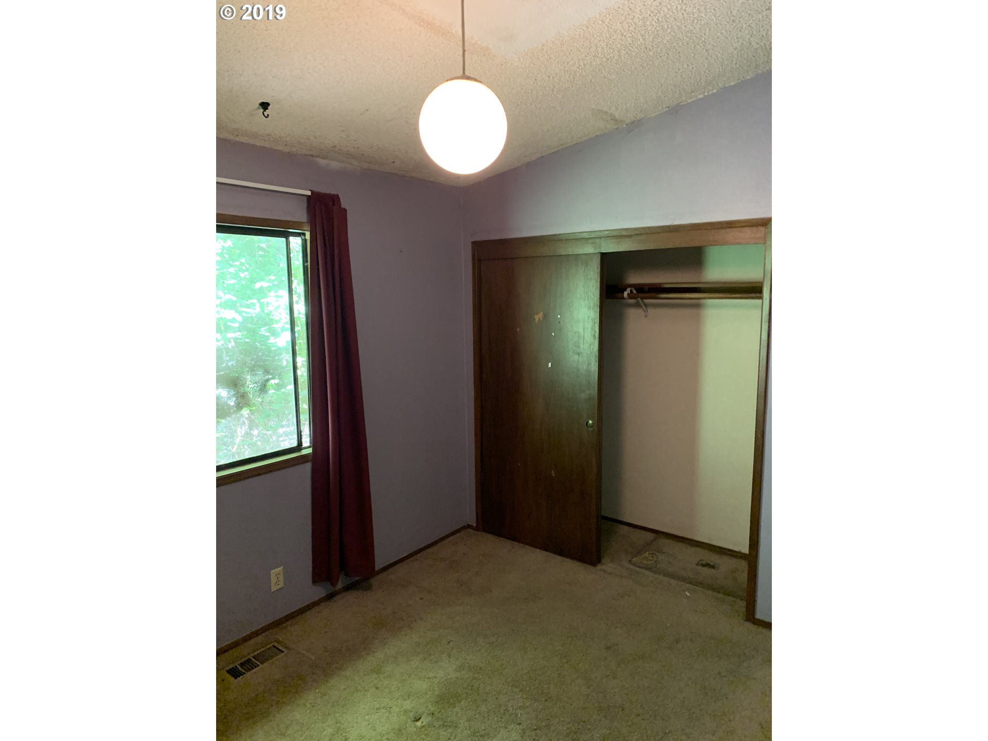 39969 Southwest Gibson Road Gaston, OR 97119 - Photo 8 of 11 a view of a room that has a window in it