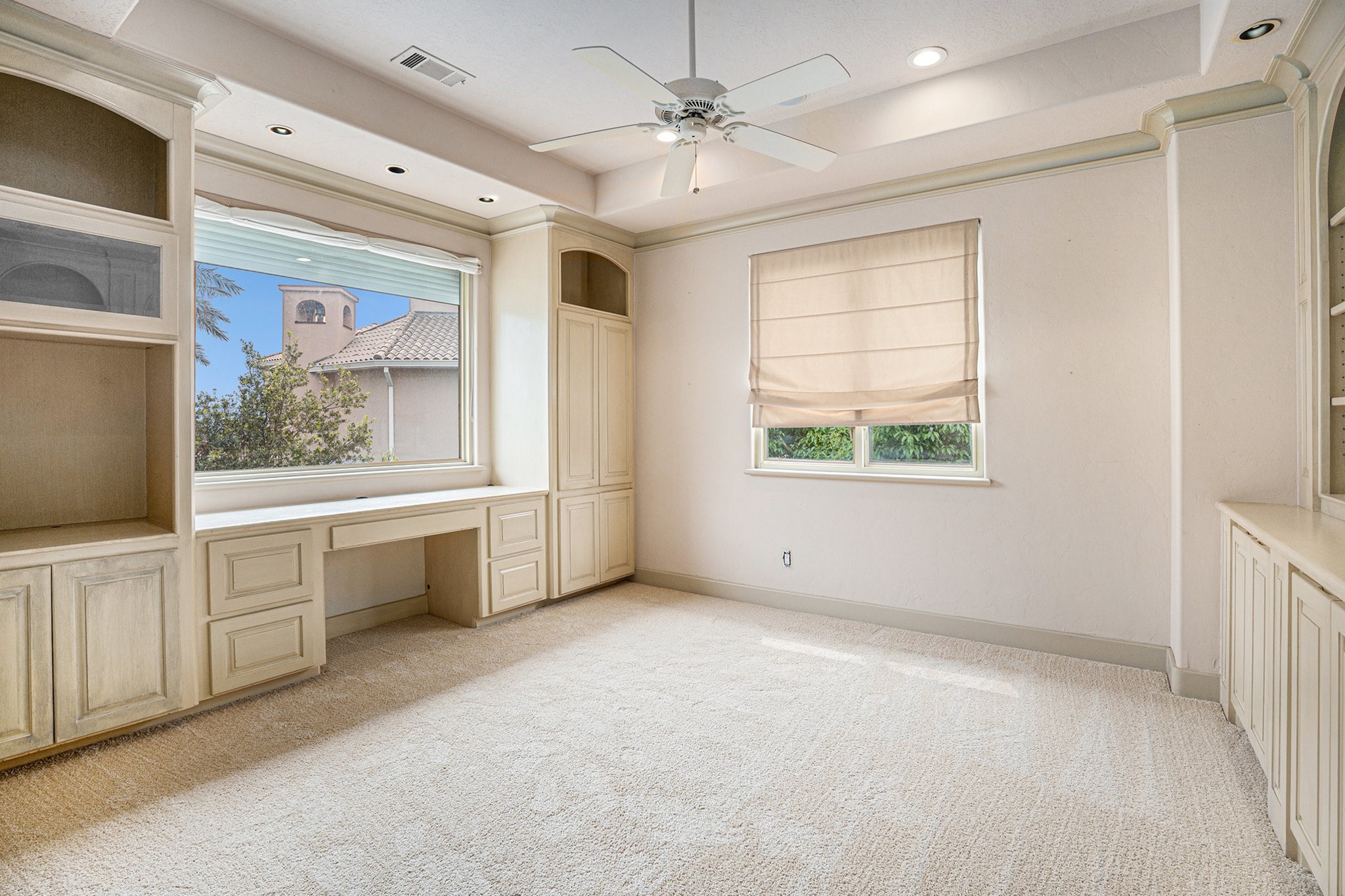 427 East Shore Drive Clear Lake Shores, TX 77565 - Photo 17 of 28 a view of an empty room with a window and a kitchen