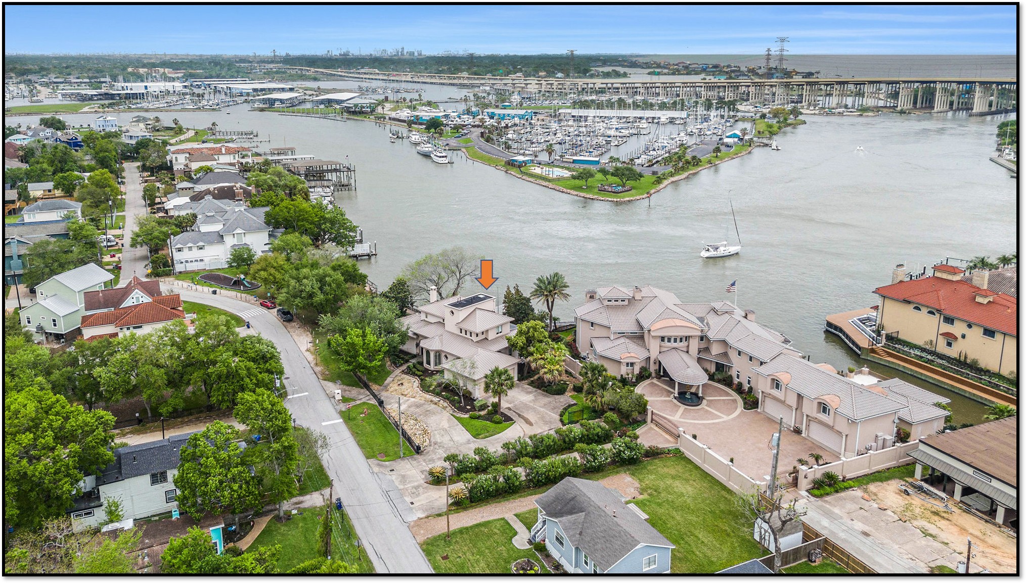 427 East Shore Drive Clear Lake Shores, TX 77565 - Photo 2 of 28 an aerial view of a city