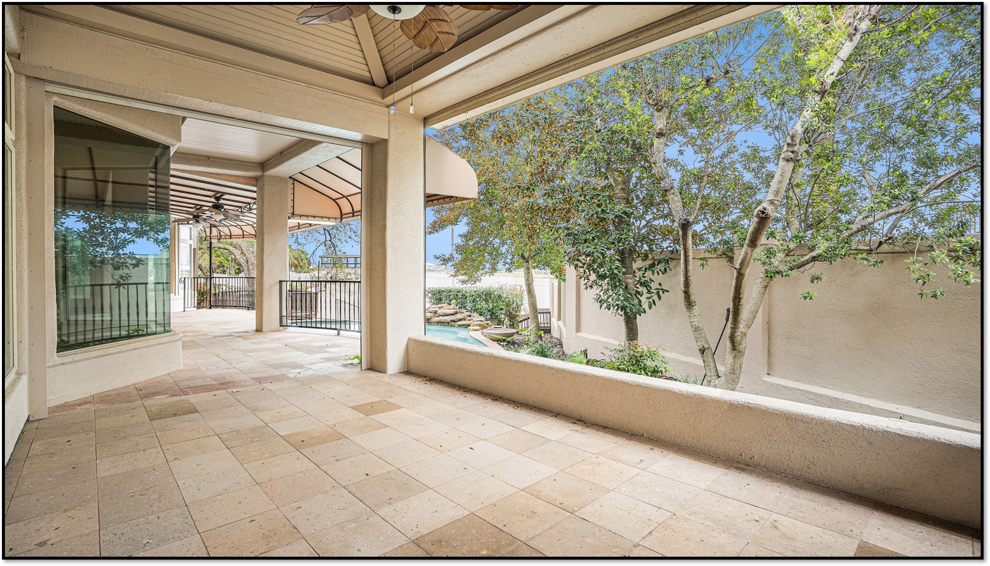 427 East Shore Drive Clear Lake Shores, TX 77565 - Photo 22 of 28 a view of a glass door with a yard