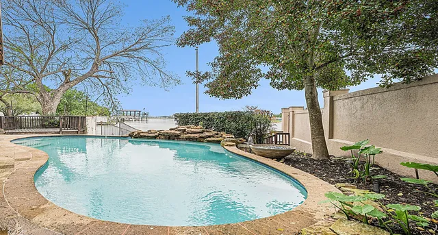 a view of a room with window and hardwood floor