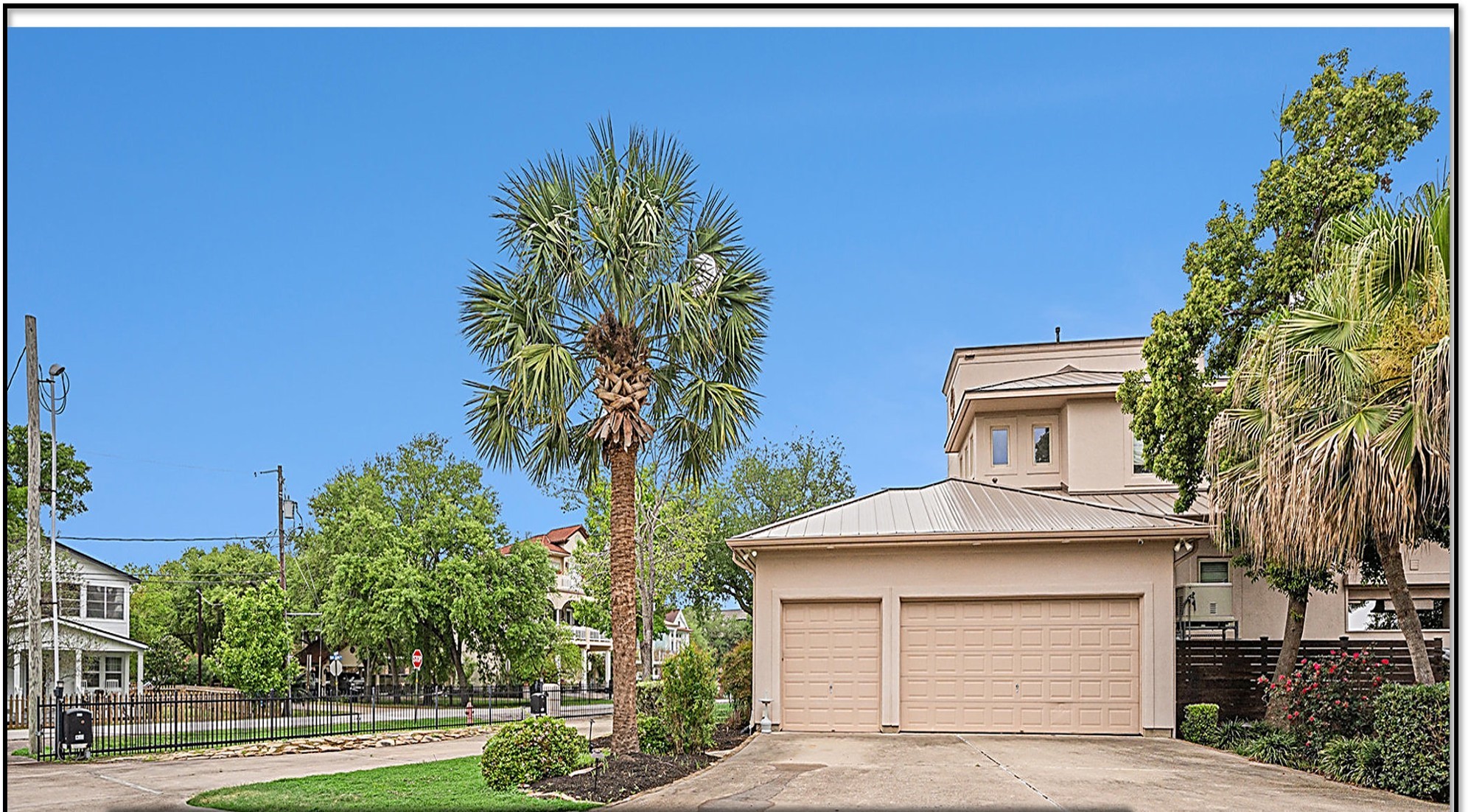 427 East Shore Drive Clear Lake Shores, TX 77565 - Photo 3 of 28 a front view of a house with a garden
