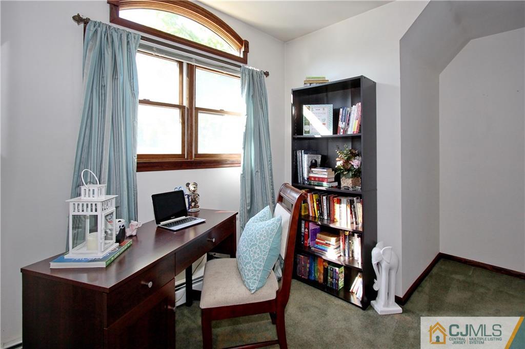 60 Morningside Road Colonia, NJ 07067 - Photo 13 of 21 a view of a workspace with furniture and a window