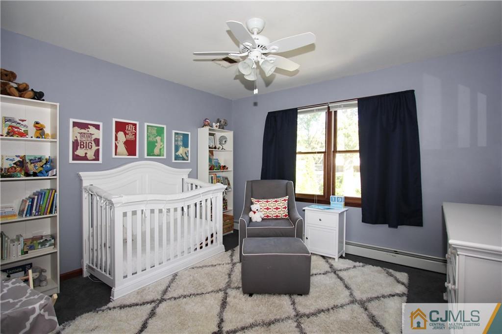 60 Morningside Road Colonia, NJ 07067 - Photo 16 of 21 a bedroom with furniture and a large window