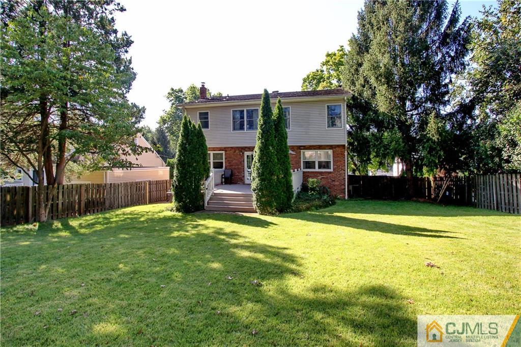 60 Morningside Road Colonia, NJ 07067 - Photo 21 of 21 a front view of a house with a yard