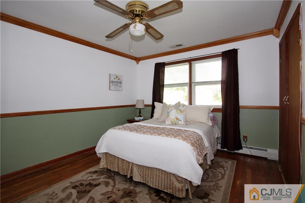 60 Morningside Road Colonia, NJ 07067 - Photo 10 of 21 a bedroom with a bed and a window