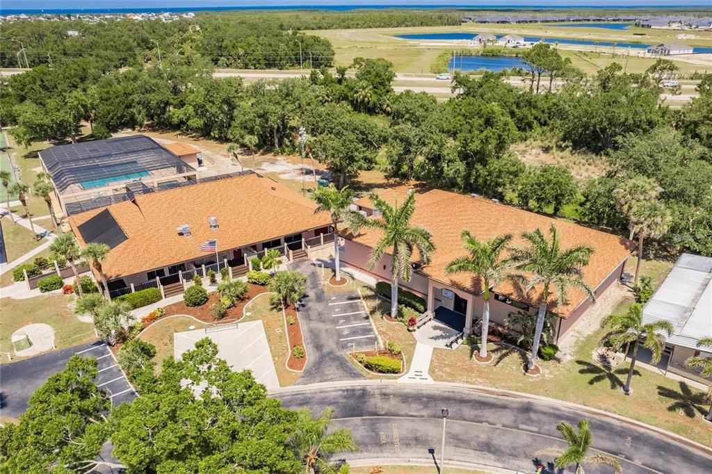 15550 Burnt Store Road, Unit 22 Punta Gorda, FL 33955 - Photo 27 of 39 an aerial view of a house with a swimming pool