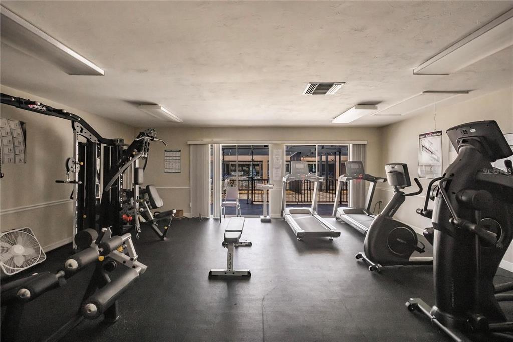15550 Burnt Store Road, Unit 22 Punta Gorda, FL 33955 - Photo 32 of 39 a view of a room with gym equipment