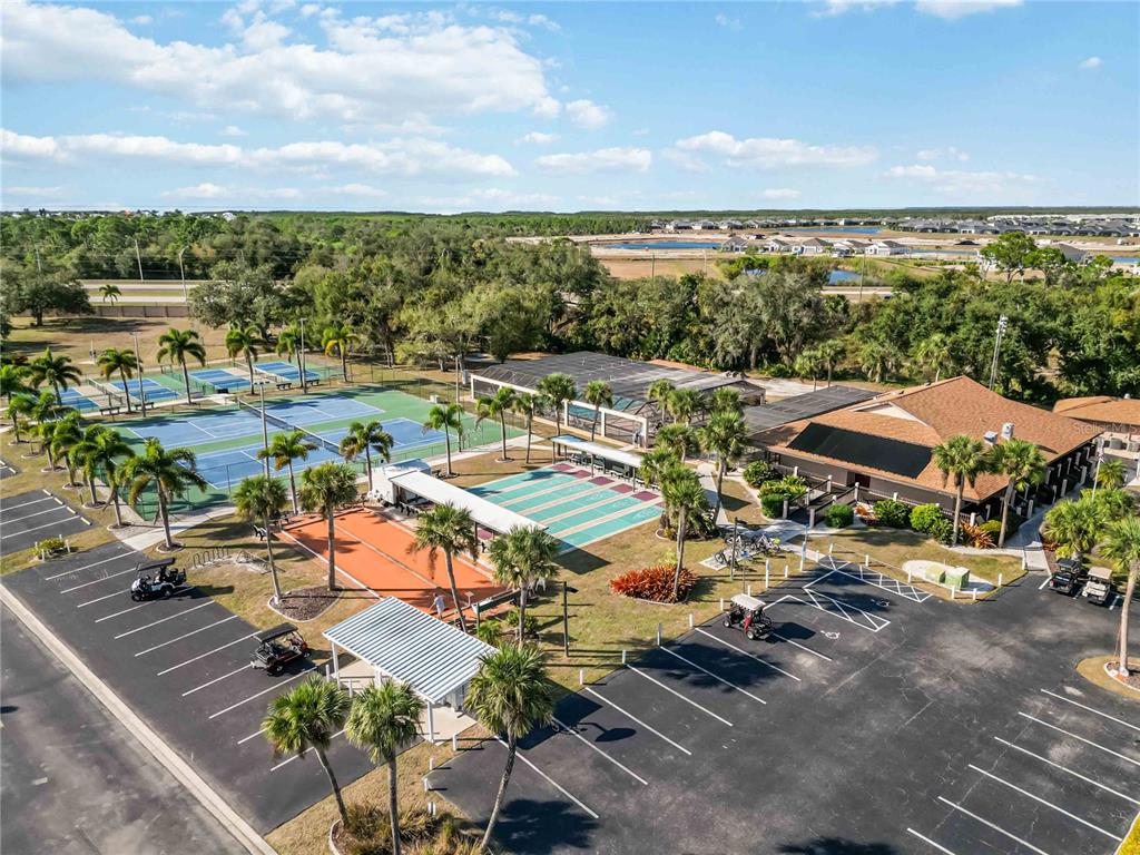 15550 Burnt Store Road, Unit 22 Punta Gorda, FL 33955 - Photo 33 of 39 an aerial view of a houses with a lake view