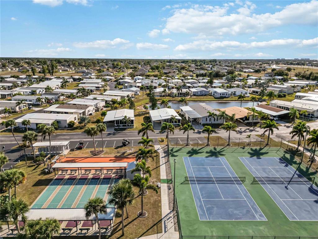15550 Burnt Store Road, Unit 22 Punta Gorda, FL 33955 - Photo 38 of 39 an aerial view of a residential houses with city view
