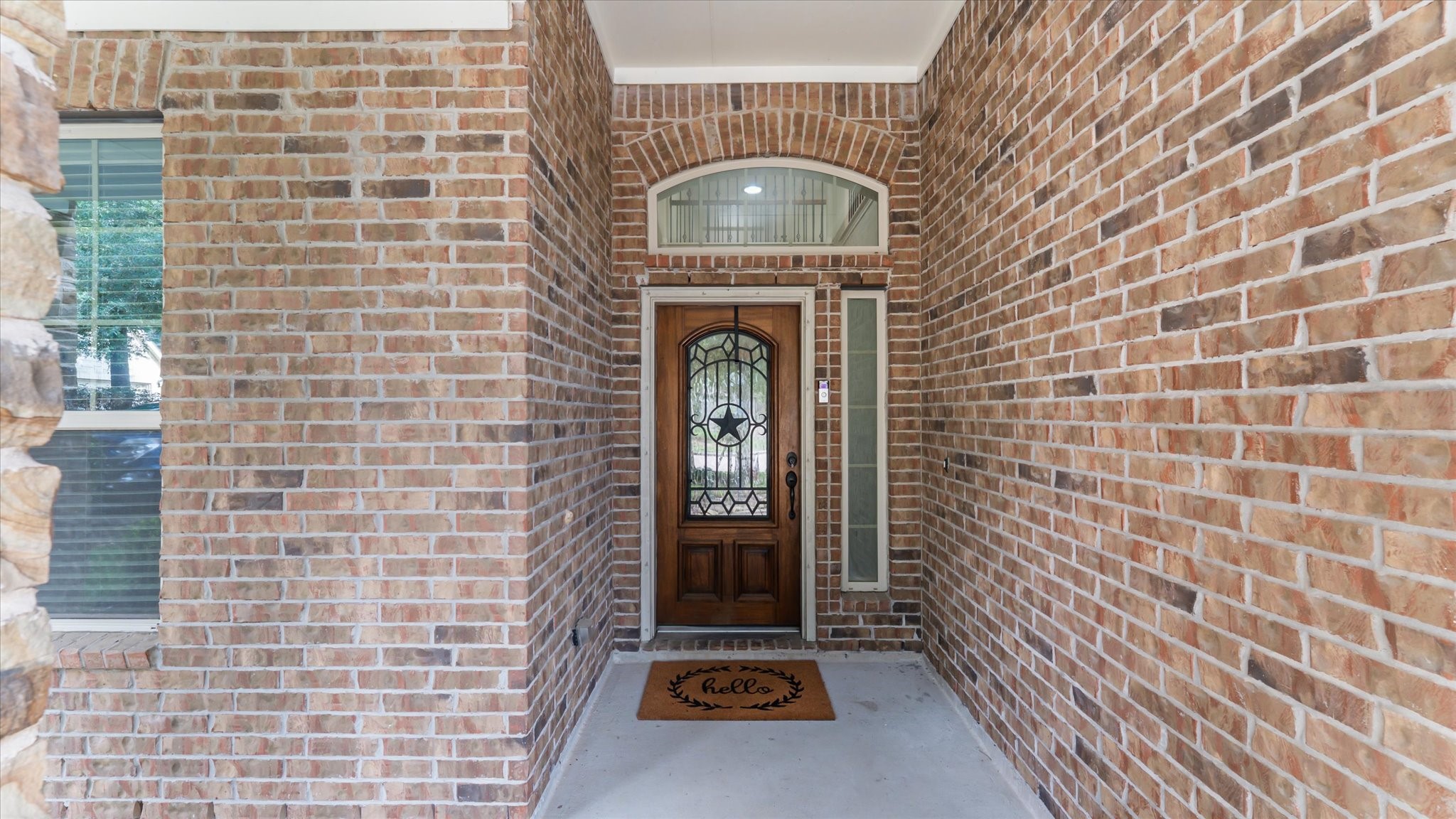 14 Painted Post Place Spring, TX 77389 - Photo 5 of 43 a front view of a house with garden