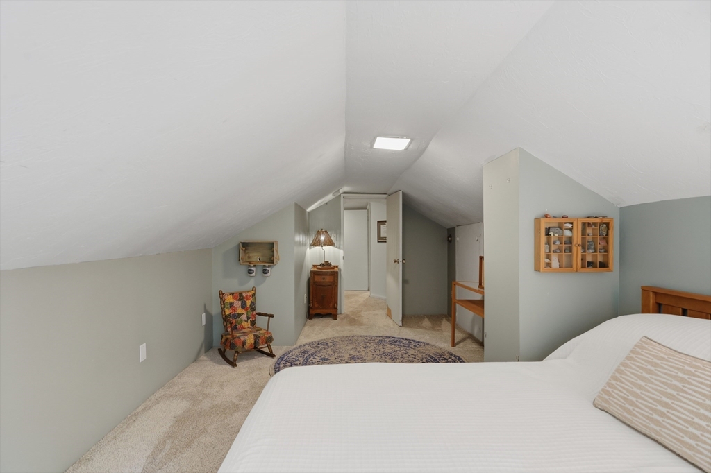 60 Petersham Road Phillipston, MA 01331 - Photo 22 of 33 a bedroom with a bed and a large mirror