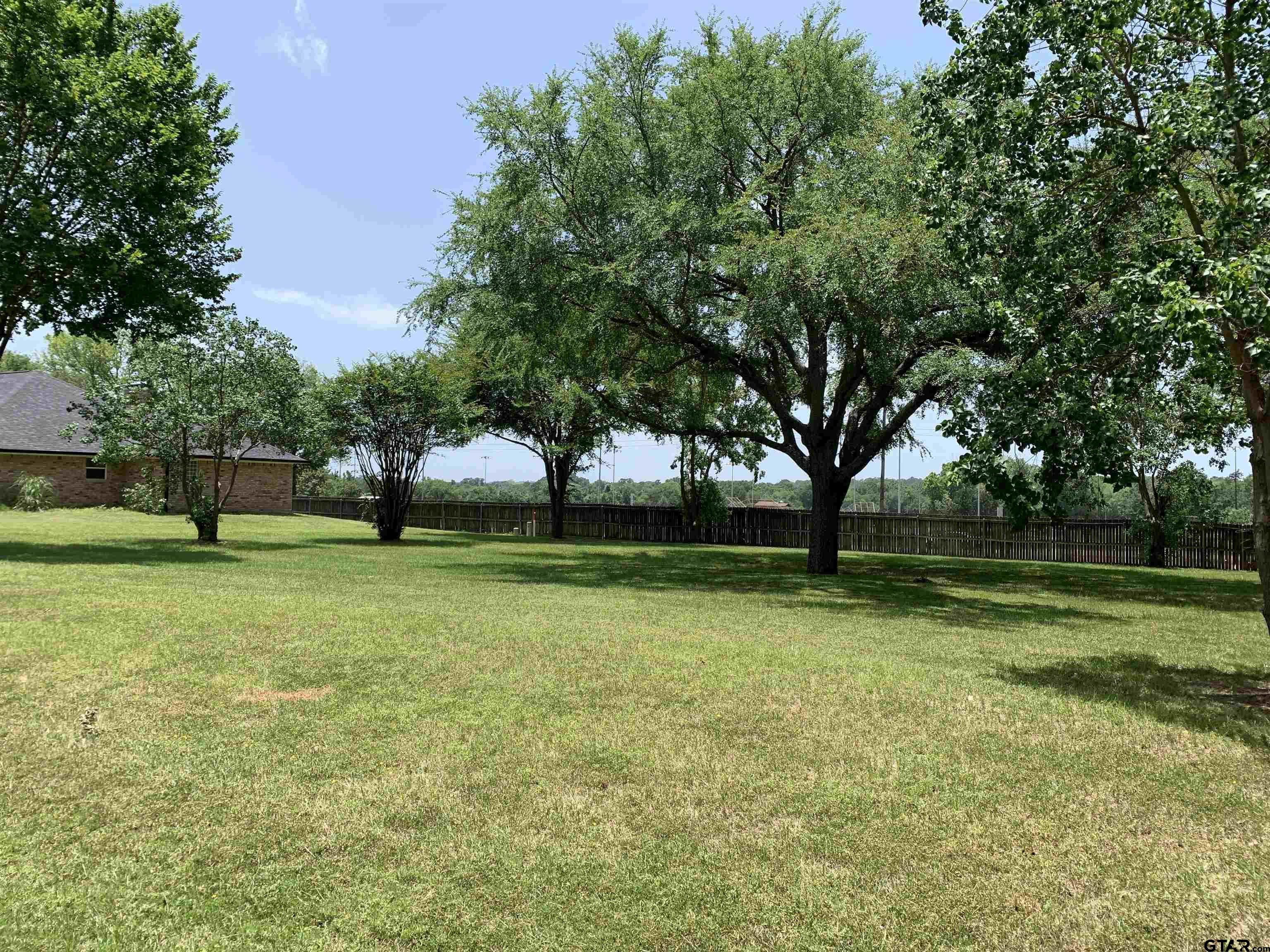 Tbd Van Winkle Circle Athens, TX 75751 - Photo 2 of 5 a view of a park with large trees