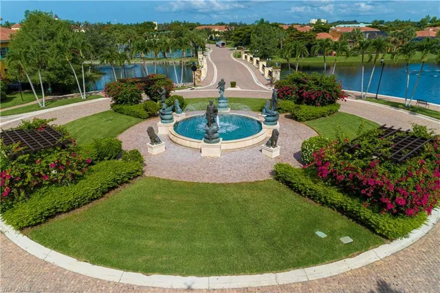 an aerial view of a house with a lake view