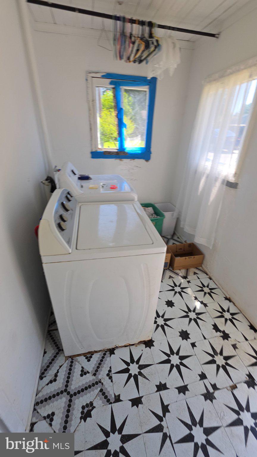 917 Baltimore Street Hanover, PA 17331 - Photo 8 of 19 Bright laundry space with vintage tiles.