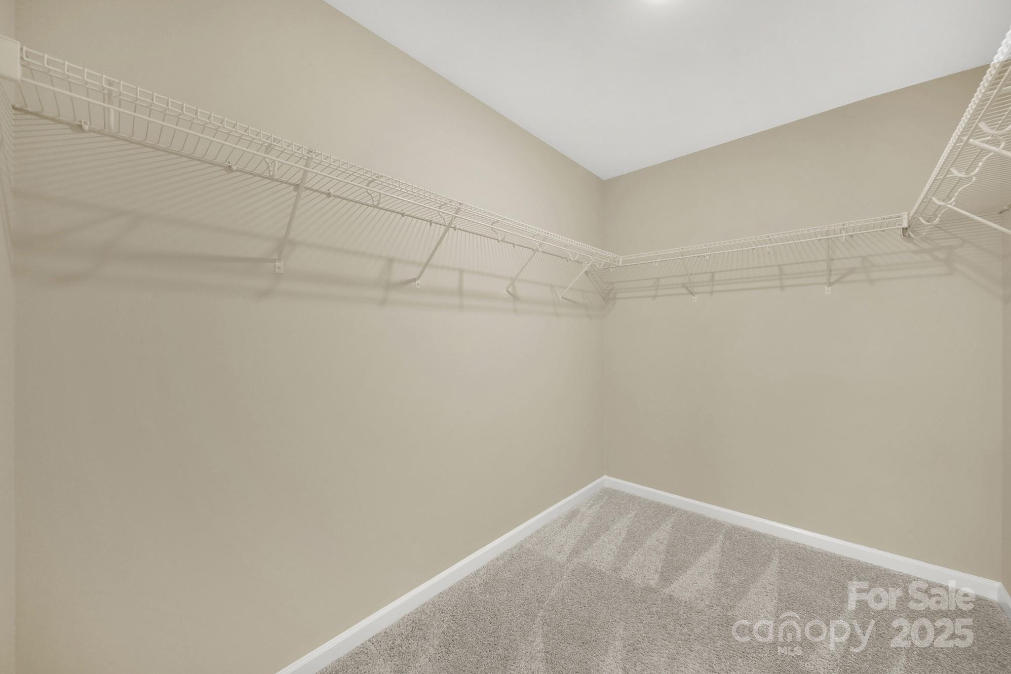 2471 Palmdale Walk Drive, Unit 107 Fort Mill, SC 29708 - Photo 17 of 30 a view of a room with racks on the wall