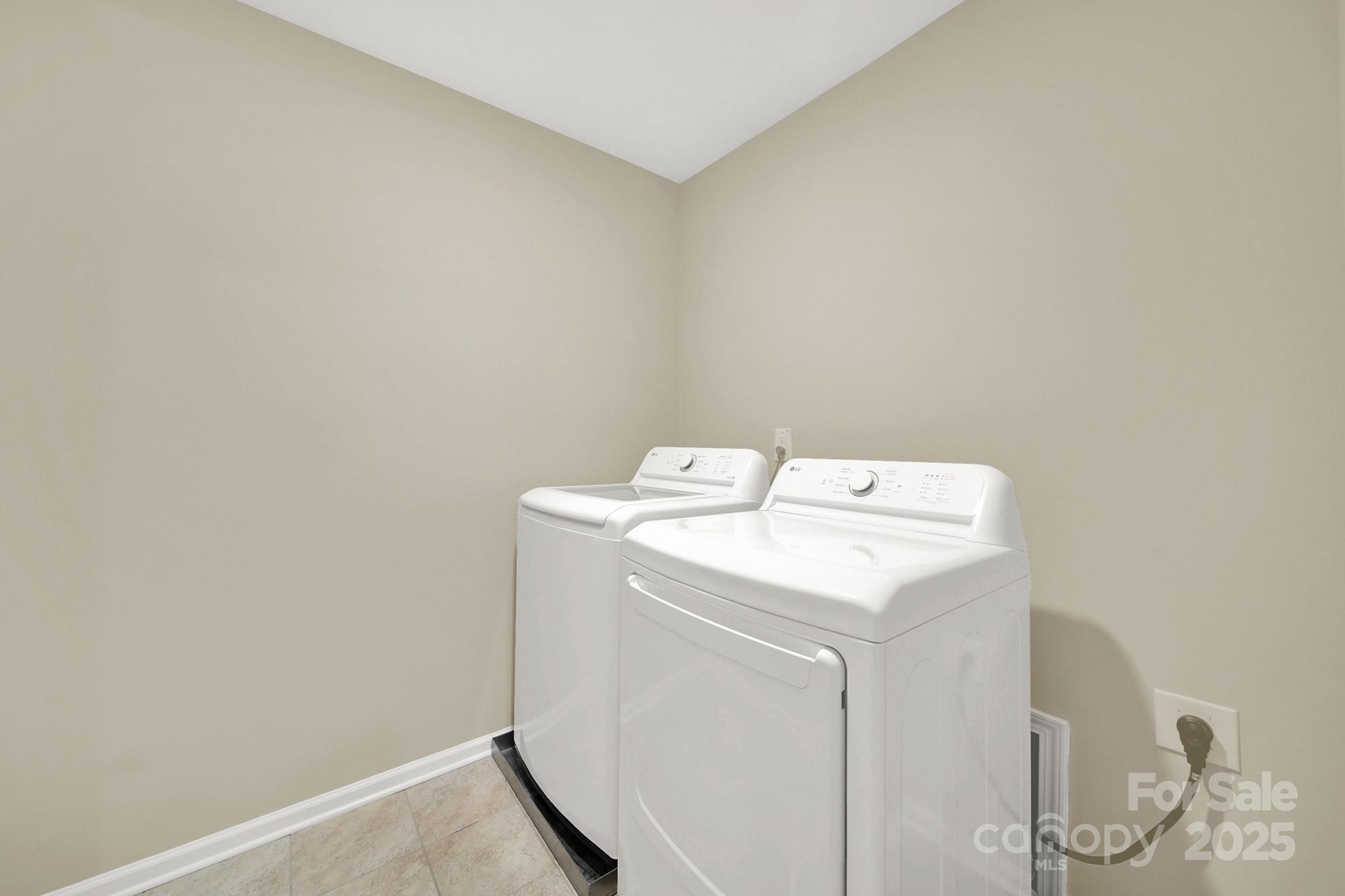2471 Palmdale Walk Drive, Unit 107 Fort Mill, SC 29708 - Photo 20 of 30 a utility room with dryer and washer