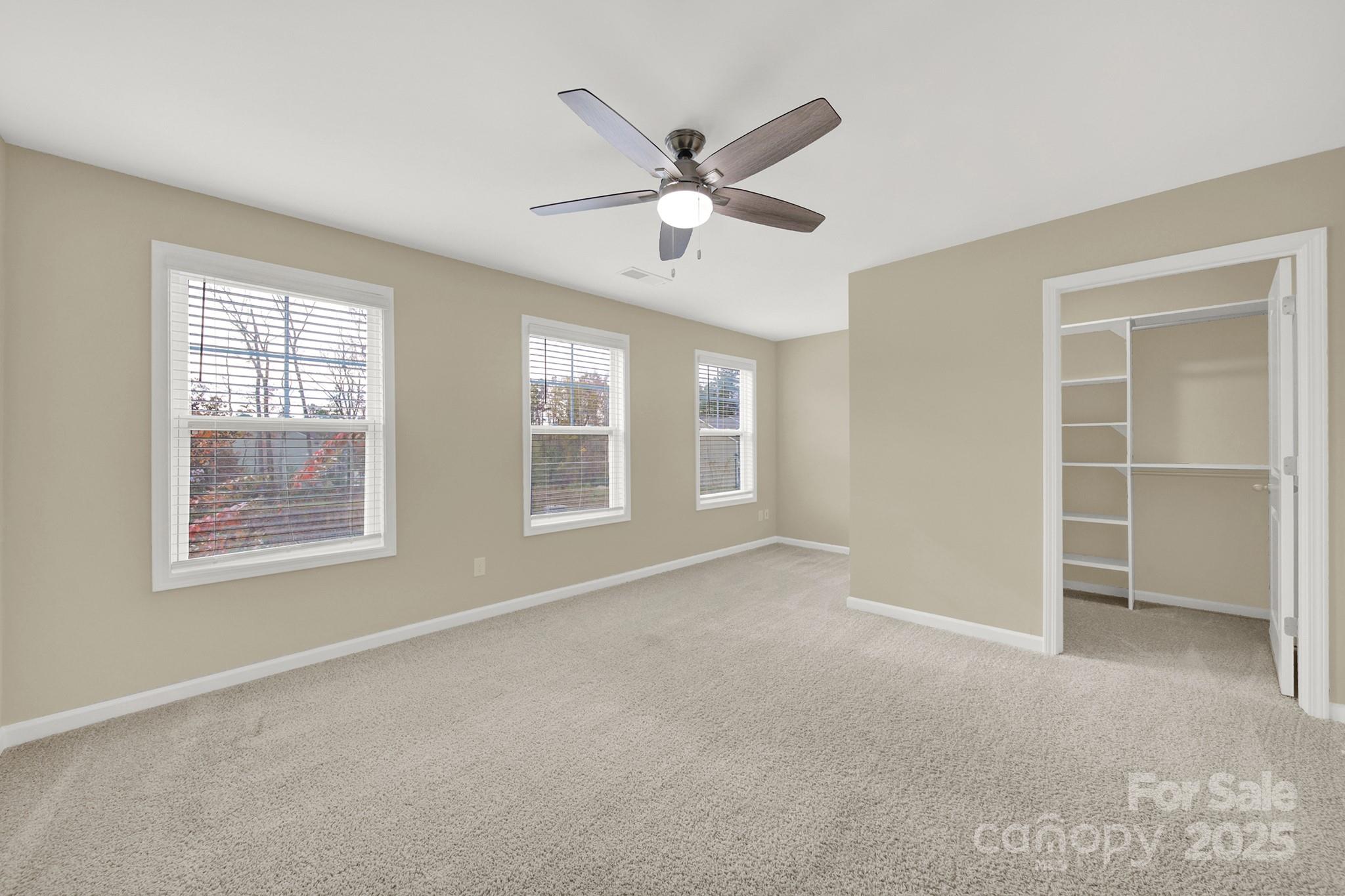 2471 Palmdale Walk Drive, Unit 107 Fort Mill, SC 29708 - Photo 21 of 30 a view of an empty room with a window