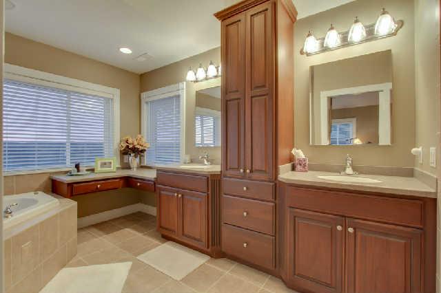 1400 Lafever Ridge Road Silver Point, TN 38582 - Photo 13 of 19 a spacious bathroom with a granite countertop double vanity sink a mirror and a bathtub