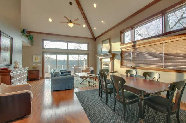 1400 Lafever Ridge Road Silver Point, TN 38582 - Photo 3 of 19 a view of a dining room with furniture large windows and wooden floor