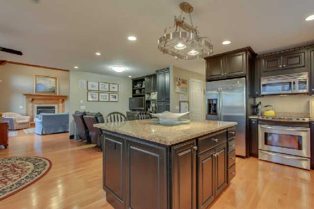 1400 Lafever Ridge Road Silver Point, TN 38582 - Photo 9 of 19 a kitchen with stainless steel appliances granite countertop a kitchen island a stove and a sink