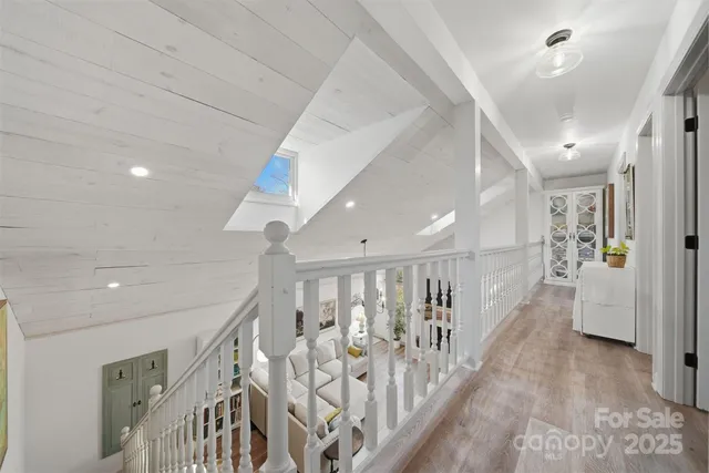 a bedroom with a bed and chair