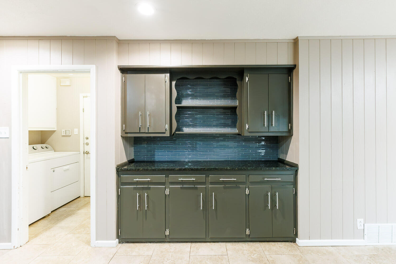 3515 36th Street Lubbock, TX 79413 - Photo 22 of 63 a kitchen with a sink and cabinets