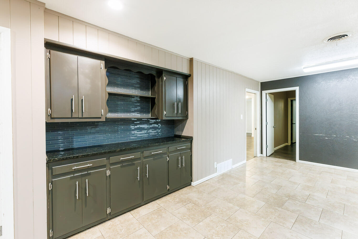3515 36th Street Lubbock, TX 79413 - Photo 23 of 63 a kitchen with a sink and cabinets