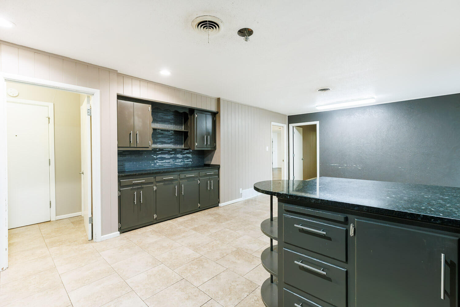 3515 36th Street Lubbock, TX 79413 - Photo 33 of 63 a kitchen with a refrigerator and a sink