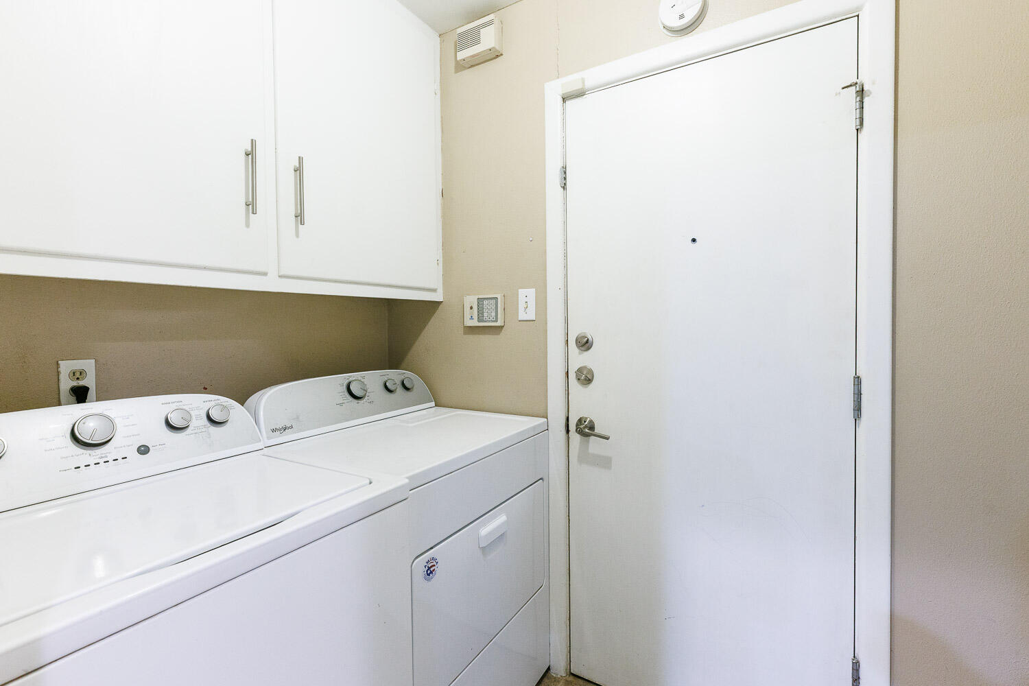 3515 36th Street Lubbock, TX 79413 - Photo 34 of 63 a view of storage room with washer and dryer