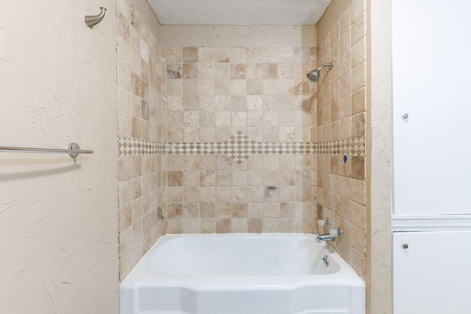 3515 36th Street Lubbock, TX 79413 - Photo 53 of 63 a bathroom with a bathtub