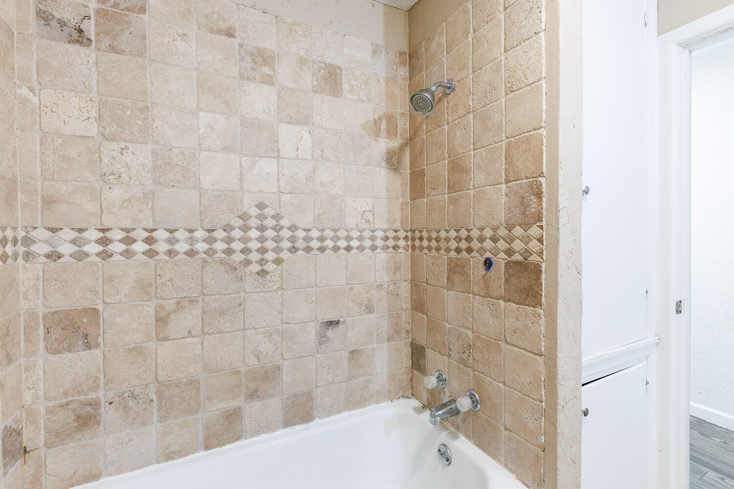 3515 36th Street Lubbock, TX 79413 - Photo 54 of 63 a bathroom with a bathtub and shower