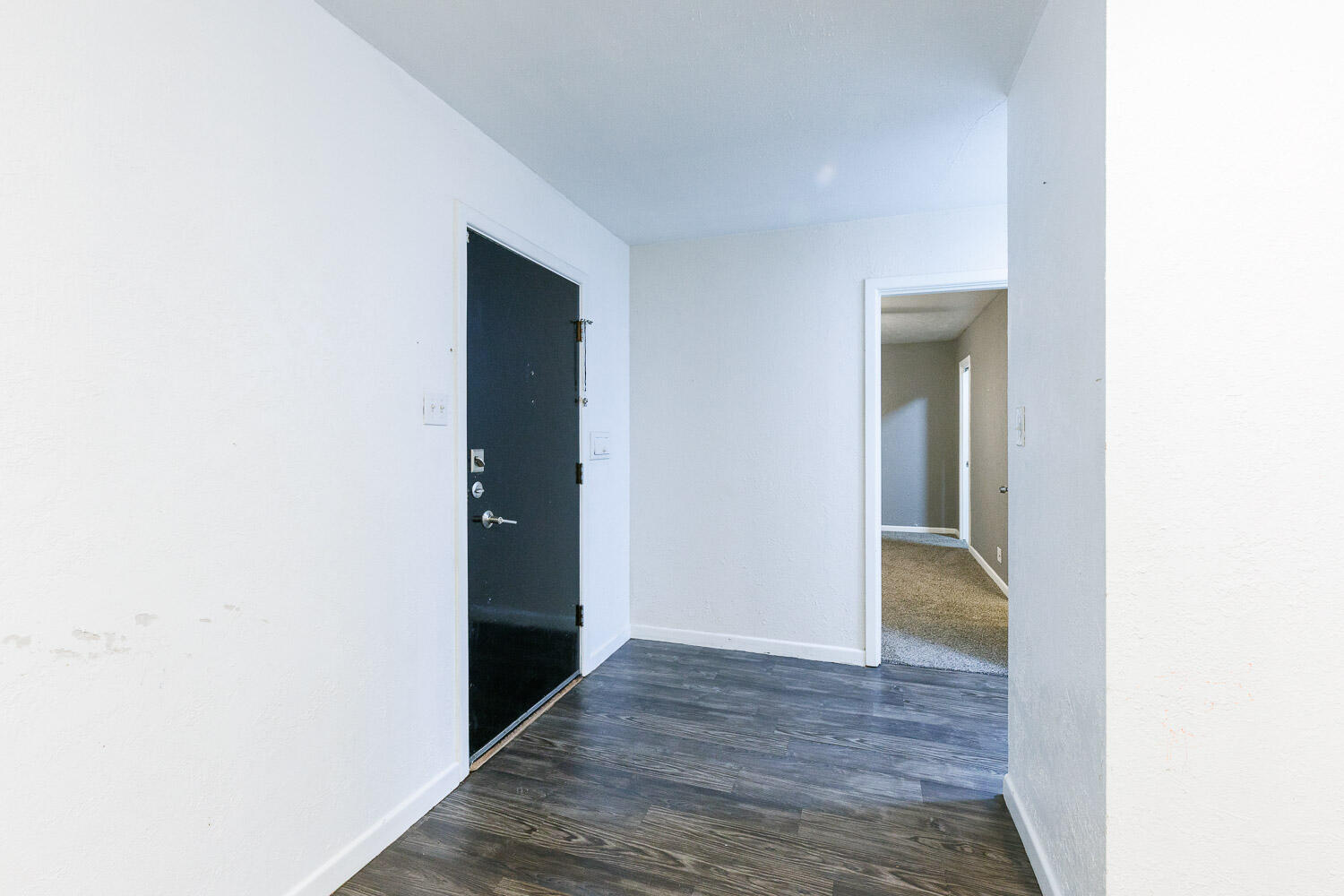 3515 36th Street Lubbock, TX 79413 - Photo 8 of 63 a view of an empty room with closet and wooden floor