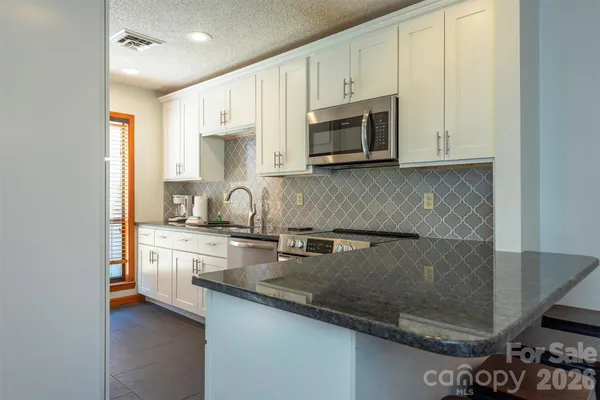 $429,900 | 128 Quail Run Court, Unit 1626, Lake Lure, NC 28746