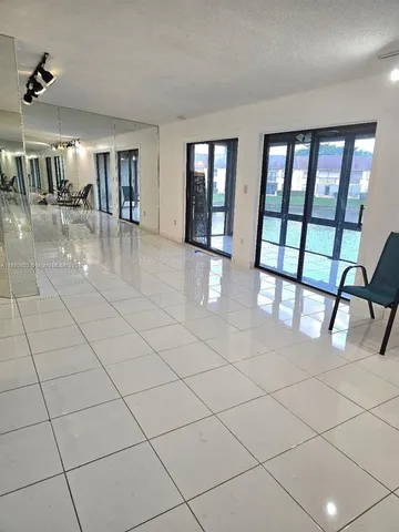 a view of front door and dining room