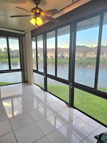 a view of an entryway with a garden