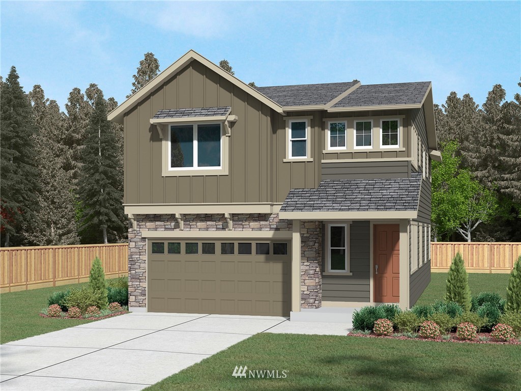 4319 Lot 20 224th Street Southeast Bothell, WA 98021 - Photo 1 of 3 a front view of a house with a yard and garage