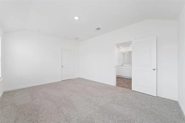 a bathroom with a double vanity sink and mirror