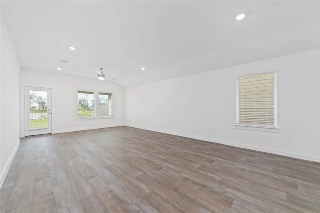 a kitchen with stainless steel appliances a sink stove and refrigerator