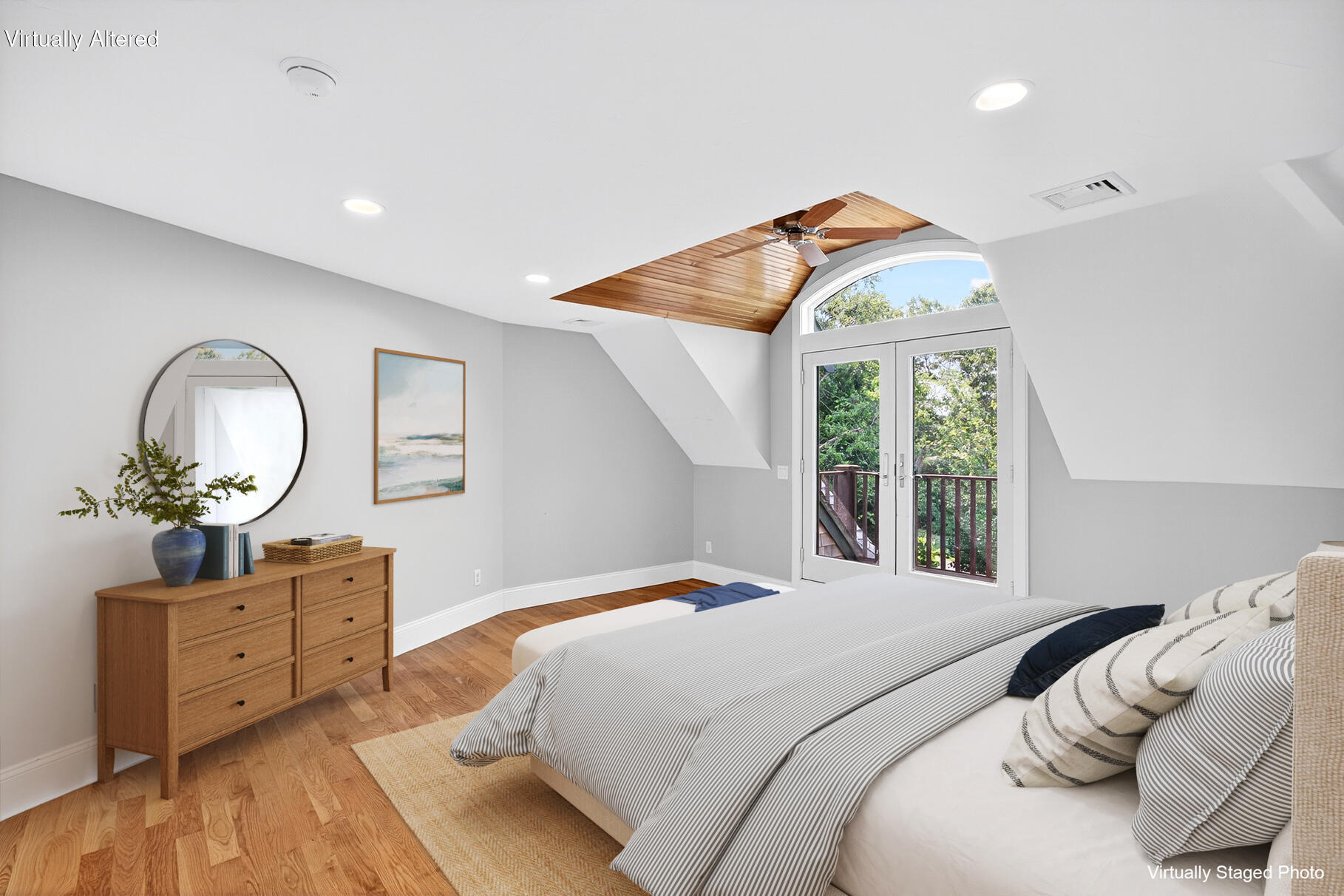 234 Cairn Ridge Road East Falmouth, MA 02536 - Photo 21 of 41 a bedroom with a bed and wooden floor