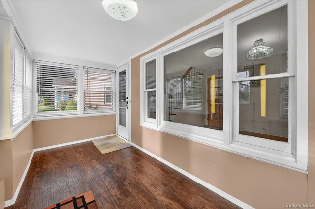 a view of empty room with front door
