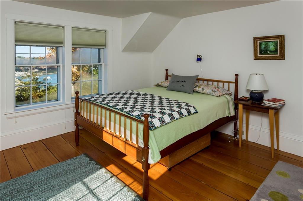 284 Knickerbocker Road Boothbay, ME 04537 - Photo 19 of 35 Bedroom with water views, fireplace,...