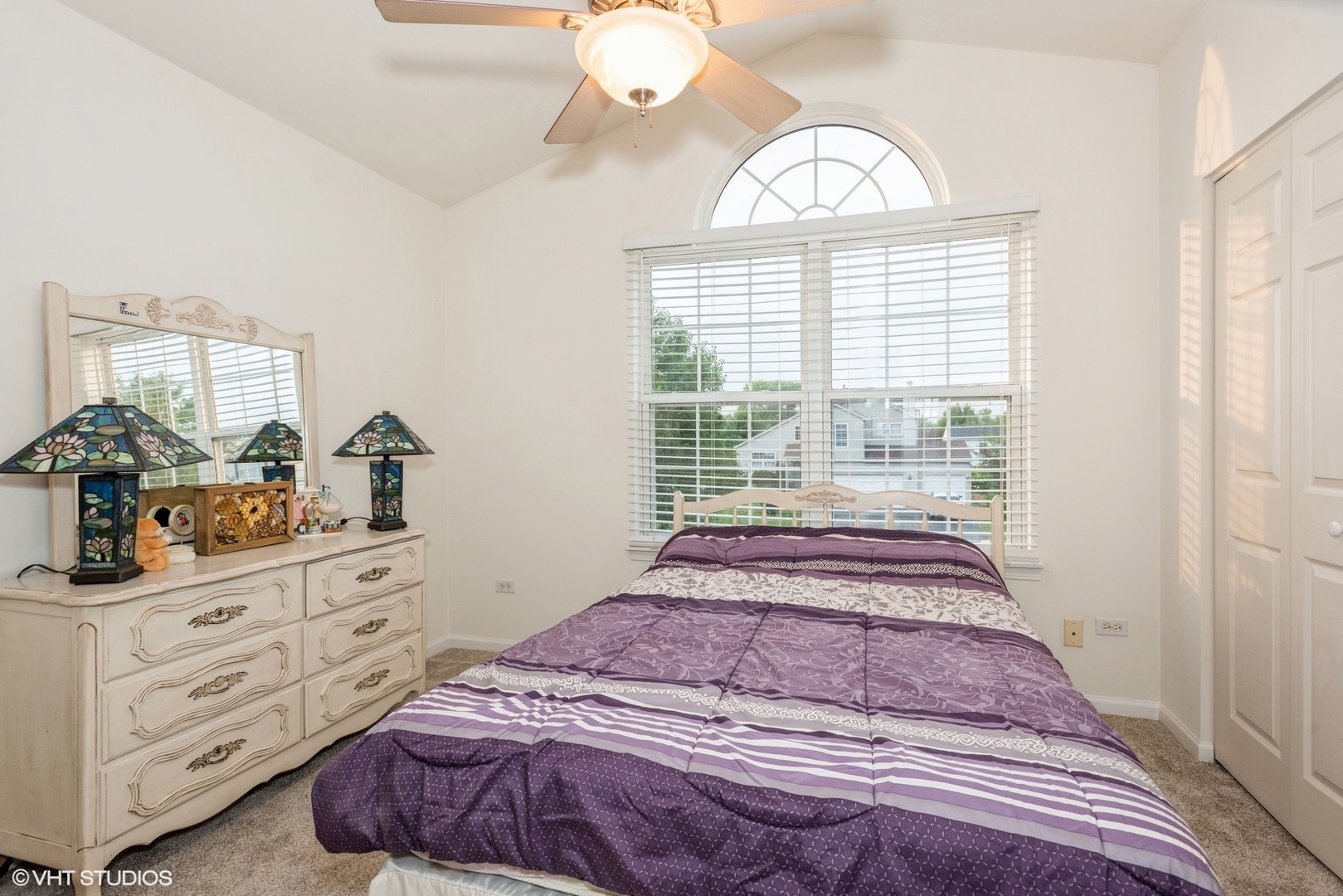 14505 Etchingham Drive Lockport, IL 60441 - Photo 14 of 19 a spacious bedroom with a bed and a dresser