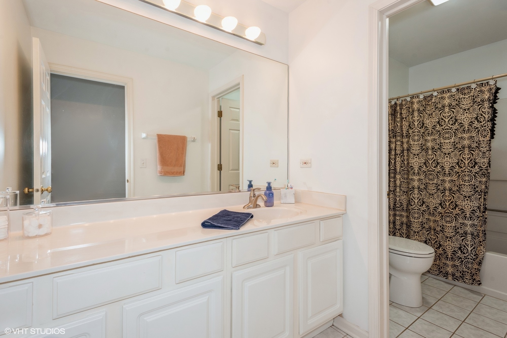 14505 Etchingham Drive Lockport, IL 60441 - Photo 15 of 19 a bathroom with a granite countertop sink a toilet and a mirror